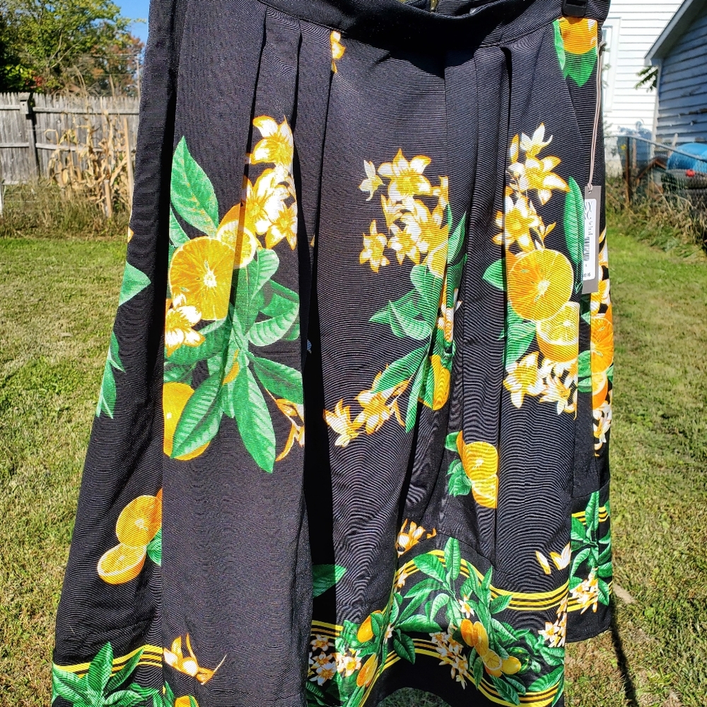 Eva Mendez oranges skirt